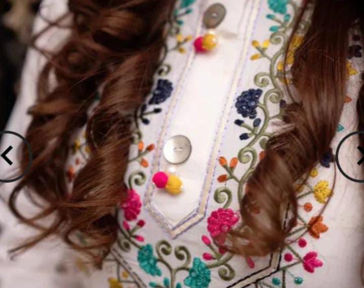 Elegant woman's 2pc suit shirt and trousers.